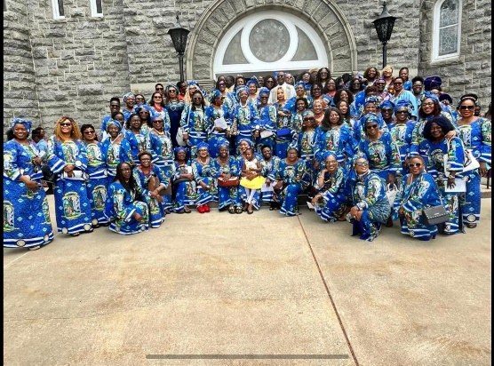 LESANs in the national Marian-blue uniform gathered outside a church